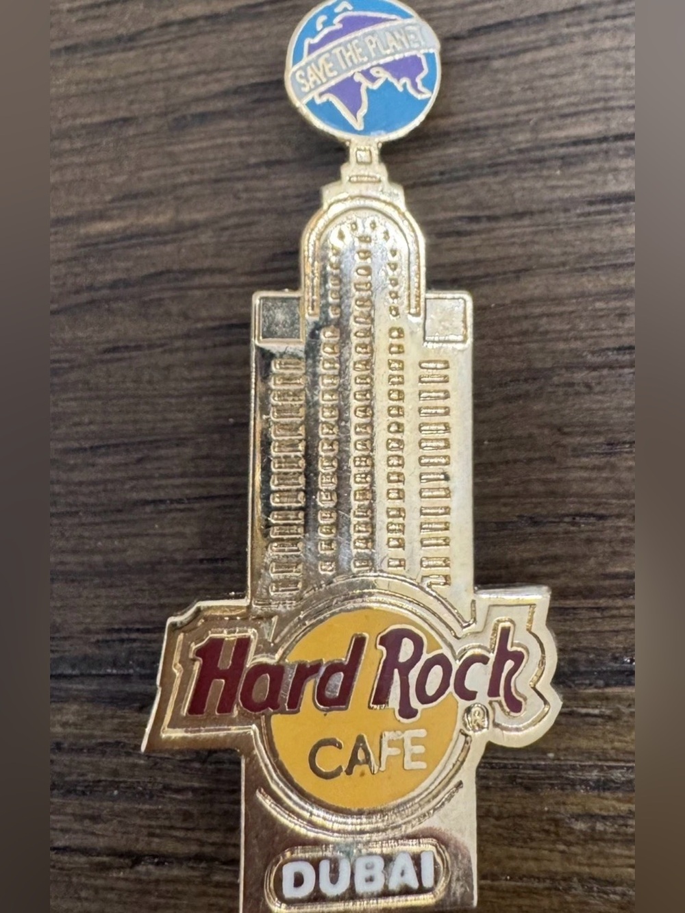 Hard Rock Cafe Dubai Gold Tone Pin with Globe on Top